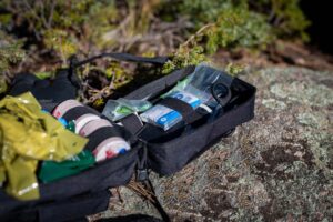 Mountain Man Medical Basecamp trauma and first aid kit opened outdoors
